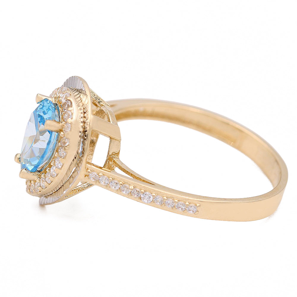 Fashion Ring with Blue Tear Drop Center Stone and Cubic Zirconias